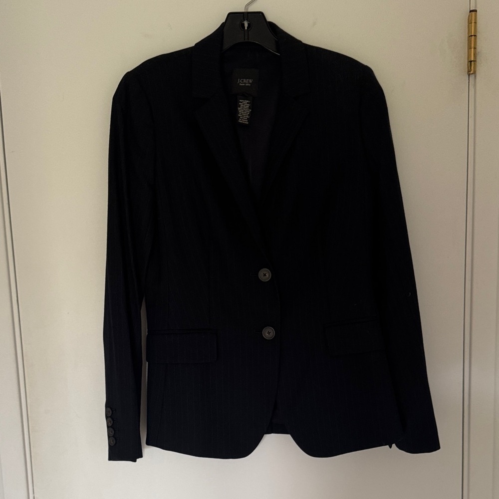 Navy blue pinstriped suit